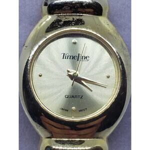 Women's Timeline watch, 90093A. Gold bangle style with white jewels on band